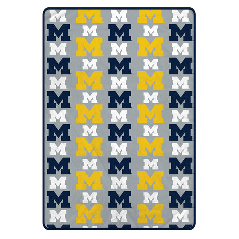Michigan Wolverines 60" x 80" Logo Roll Oversized Ultra Soft Throw Blanket - Hanger