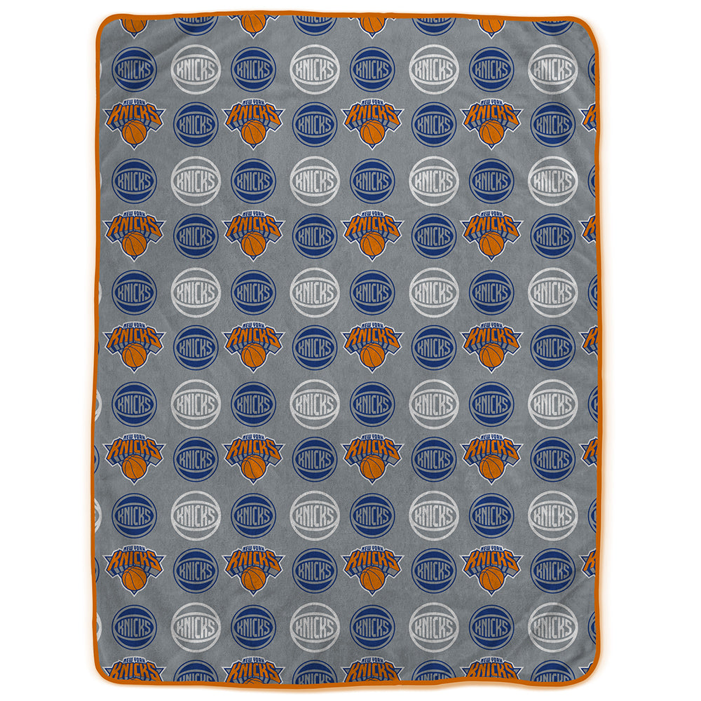 New York Knicks 60" x 80" Logo Roll Oversized Ultra Soft Throw Blanket - Hanger